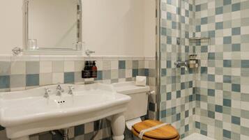 Combined shower/tub, hair dryer, towels, soap