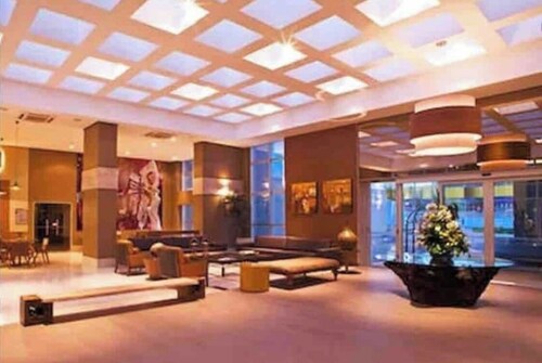 Um Flat Dentro de um Hotel de Luxo Localizado Próximo aos Grandes Shoppings