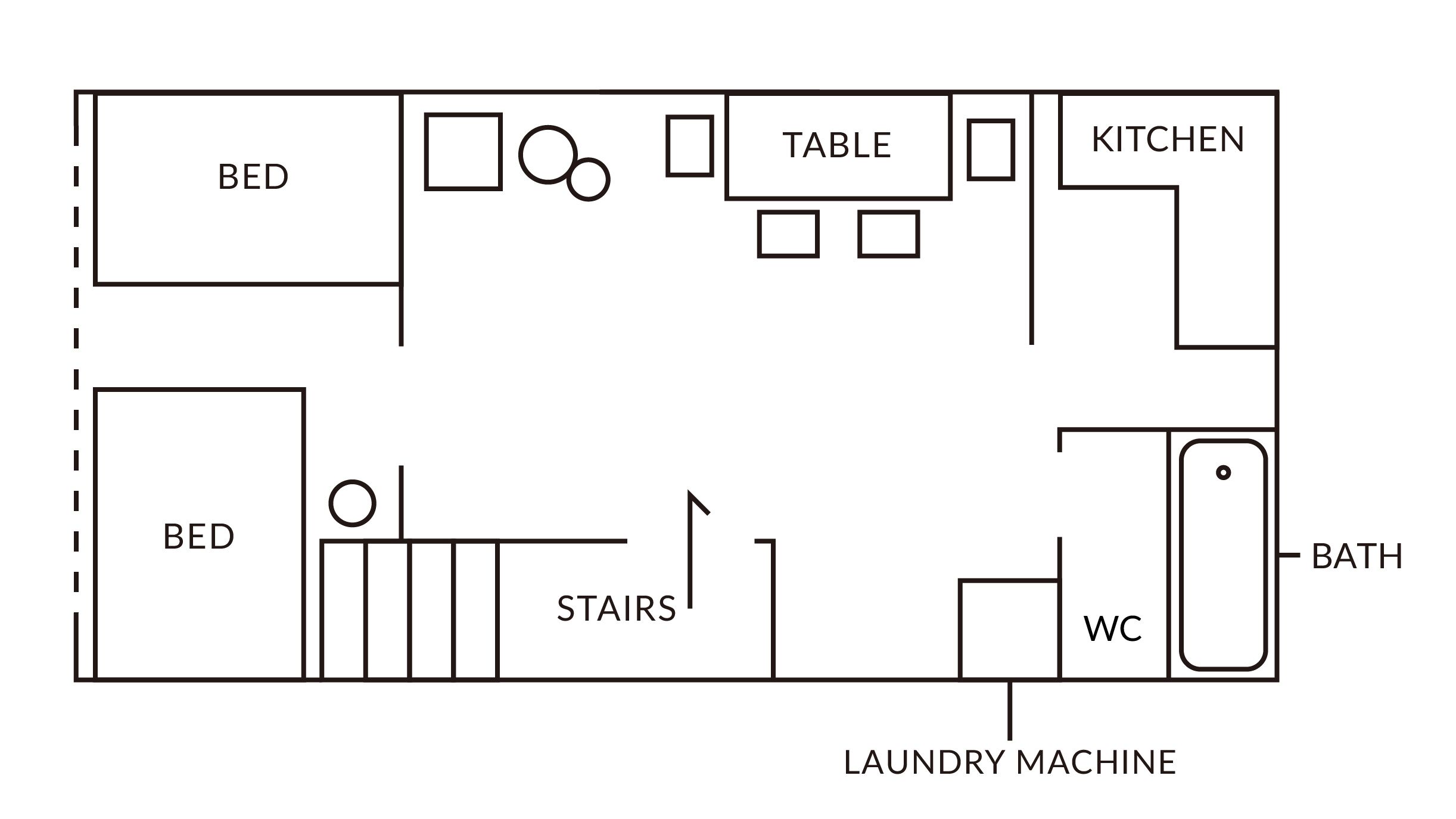 A floor plan of a hotel room with a bed, table, kitchen, bathroom, stairs, and a laundry machine.