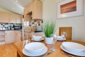 Fridge, microwave, oven, cookware/dishes/utensils