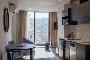 King Studio | Premium bedding, pillowtop beds, desk, blackout drapes