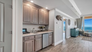 Enjoy ocean views from the dining area, where a large window offers a glimpse of the sea.