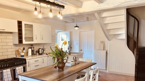 House, Multiple Beds | Private kitchen