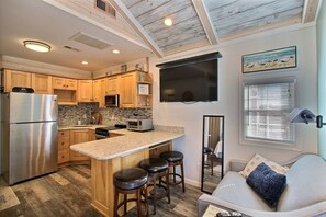 Fridge, microwave, stovetop, cookware/dishes/utensils