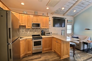 Fridge, microwave, stovetop, cookware/dishes/utensils