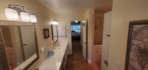 Combined shower/bathtub, hair dryer, towels, soap