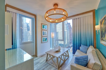 Hypo-allergenic bedding, in-room safe, desk, laptop workspace at Margaritaville Resort Times Square