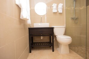 Shower, hair dryer, towels, soap