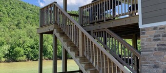 Private riverfront getaway with direct steps to fishing paradise.