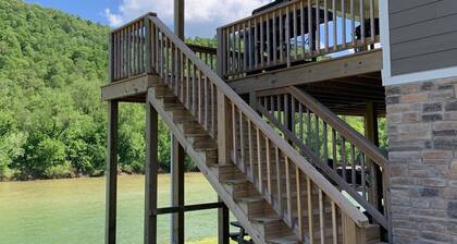 Private riverfront getaway with direct steps to fishing paradise.