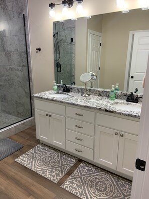Combined shower/tub, hair dryer, towels, soap