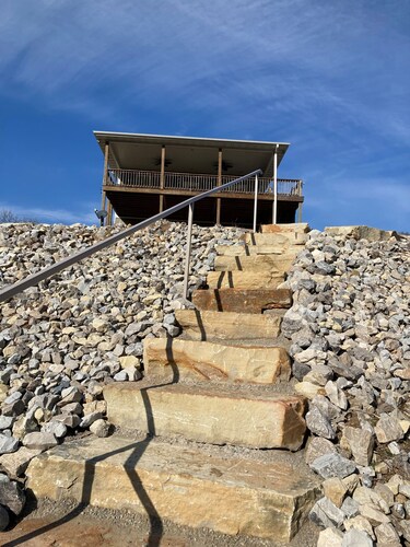 Private riverfront getaway with direct steps to fishing paradise.