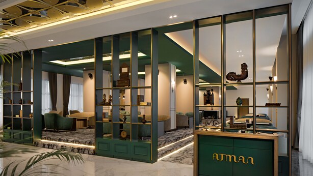 A modern hotel lobby with a green and white color scheme, marble flooring, and a reception desk labeled "ATMAN". - Sutasoma Hotel at The Tribrata Dharmawangsa (Jakarta)