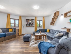 Ferienhaus | Wohnbereich | Fernseher