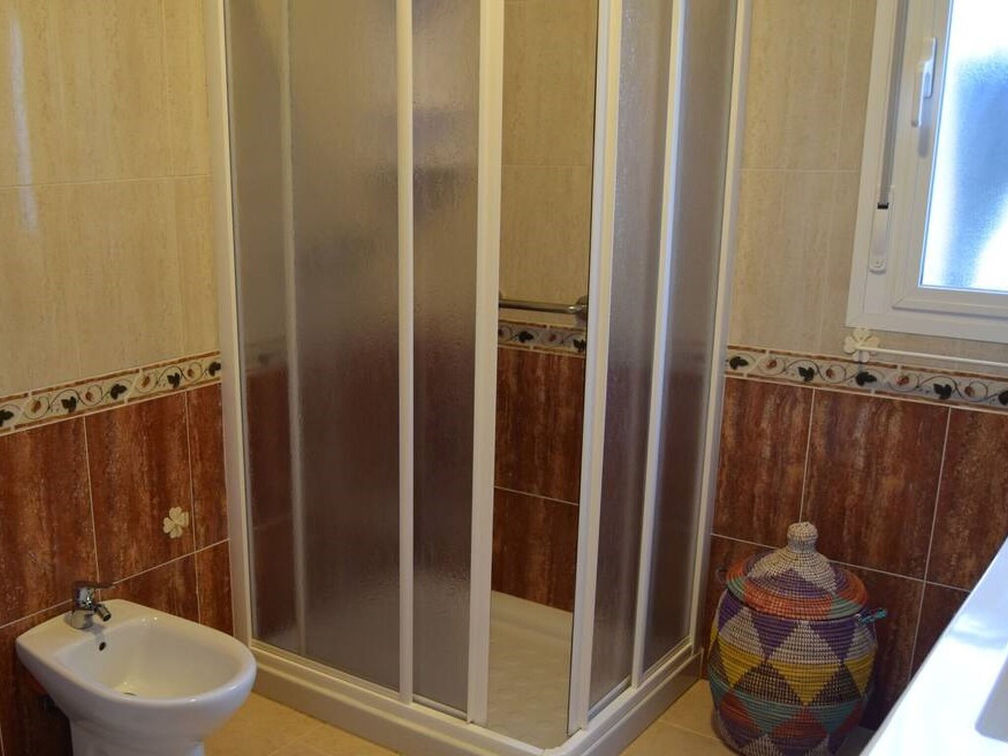 Casa | Baño | Regadera y toallas 
