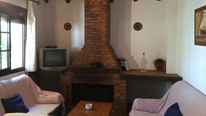 บ้านพัก | ห้องนั่งเล่น | เตาผิง