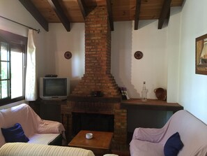 House | Living room | Fireplace - Renovated Holiday Home in Jimena de la Frontera With BBQ (Jimena de la Frontera)