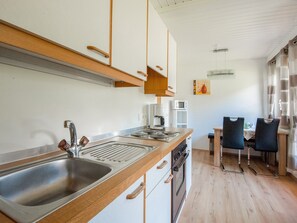 Appartamento | Cucina privata | Piano cottura
