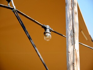 A close-up of a light fixture attached to a wooden post. - Beautiful Farmhouse in Baarlo With Private Garden (Baarlo)