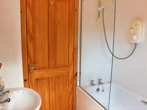 Ducha y bañera combinadas y toallas