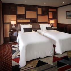 Ambassador Premium | 1 bedroom, premium bedding, pillowtop beds, in-room safe