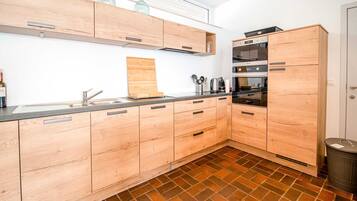 Huis | Privékeuken | Een microgolfoven, een vaatwasser