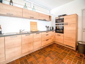 Huis | Privékeuken | Een microgolfoven, een vaatwasser