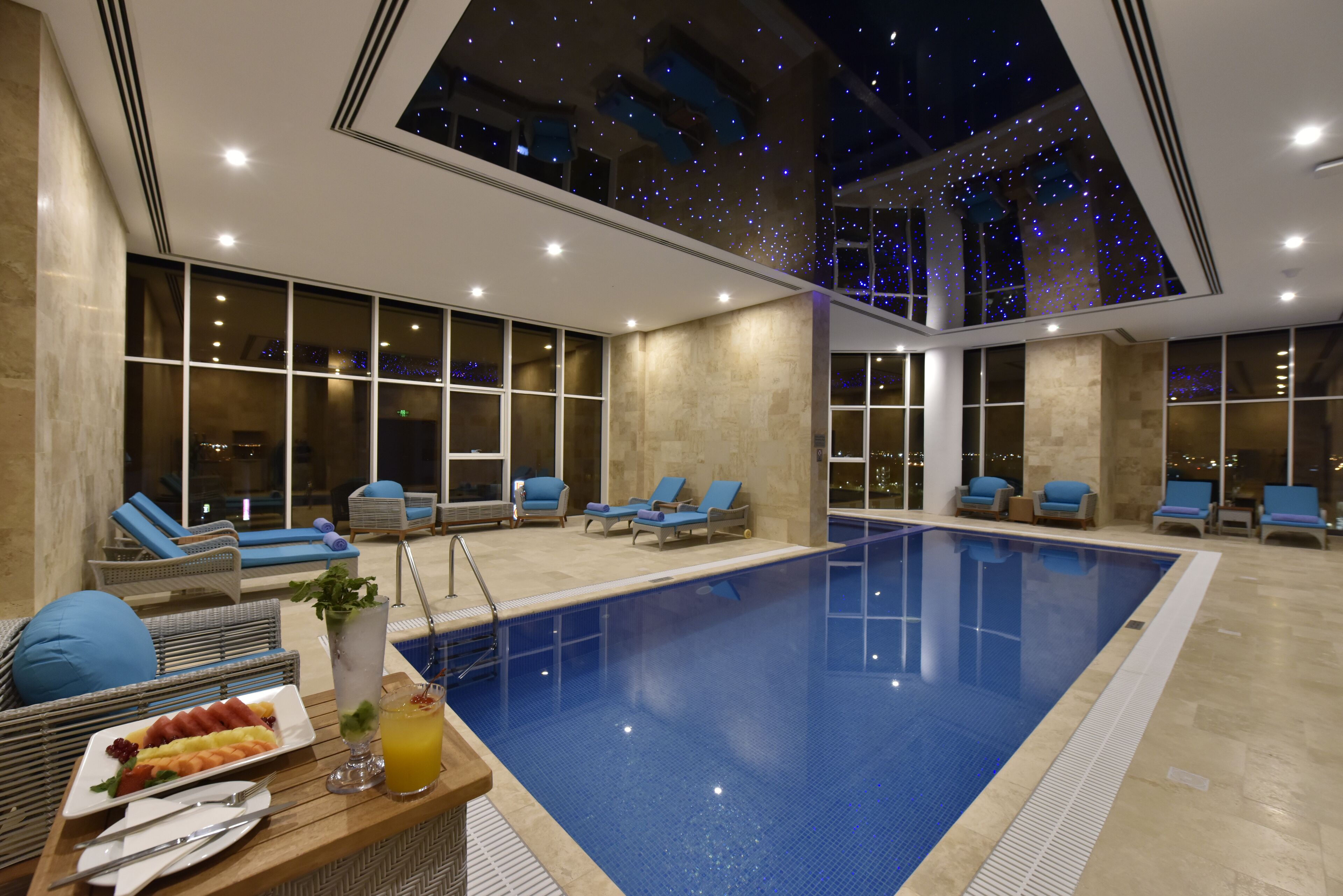 indoor pool, outdoor pool, open 7:00 am to 7:00 pm, pool loungers