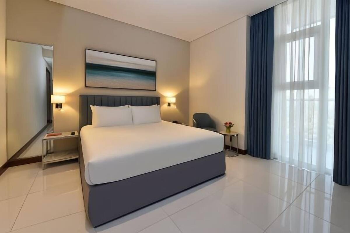 In-room safe, desk, laptop workspace, blackout curtains