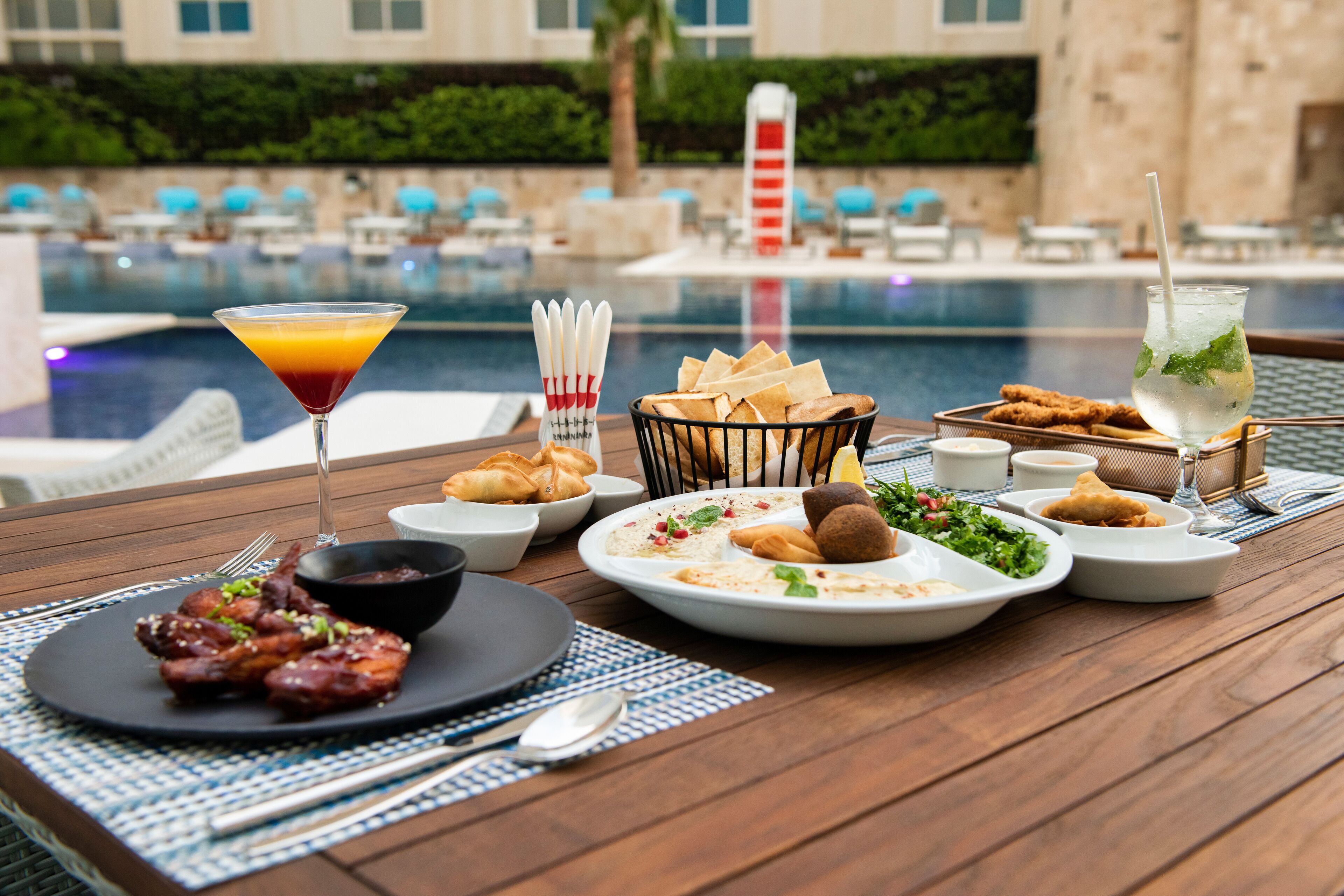 Indoor pool, outdoor pool, open 7:00 AM to 7:00 PM, sun loungers