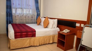 In-room safe, desk, laptop workspace, soundproofing - milestone city hotel (Nairobi)