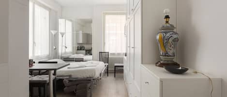 1 habitación, tabla de planchar con plancha, wifi gratis y ropa de cama