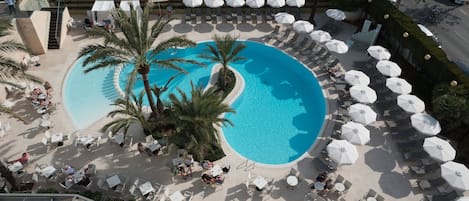 Indoor pool, outdoor pool, open 10:00 AM to 6:00 PM, pool umbrellas