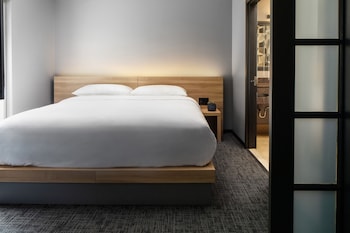 Superior Suite | Premium bedding, in-room safe, desk, laptop workspace at Henn na Hotel New York