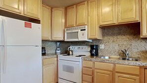 Condo, 2 Bedrooms | Private kitchen | Fridge, oven, coffee/tea maker, toaster