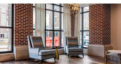 Studio sleeps 4; kitchen - 1 partial; bedding includes 1 king bed, 1 sofa bed