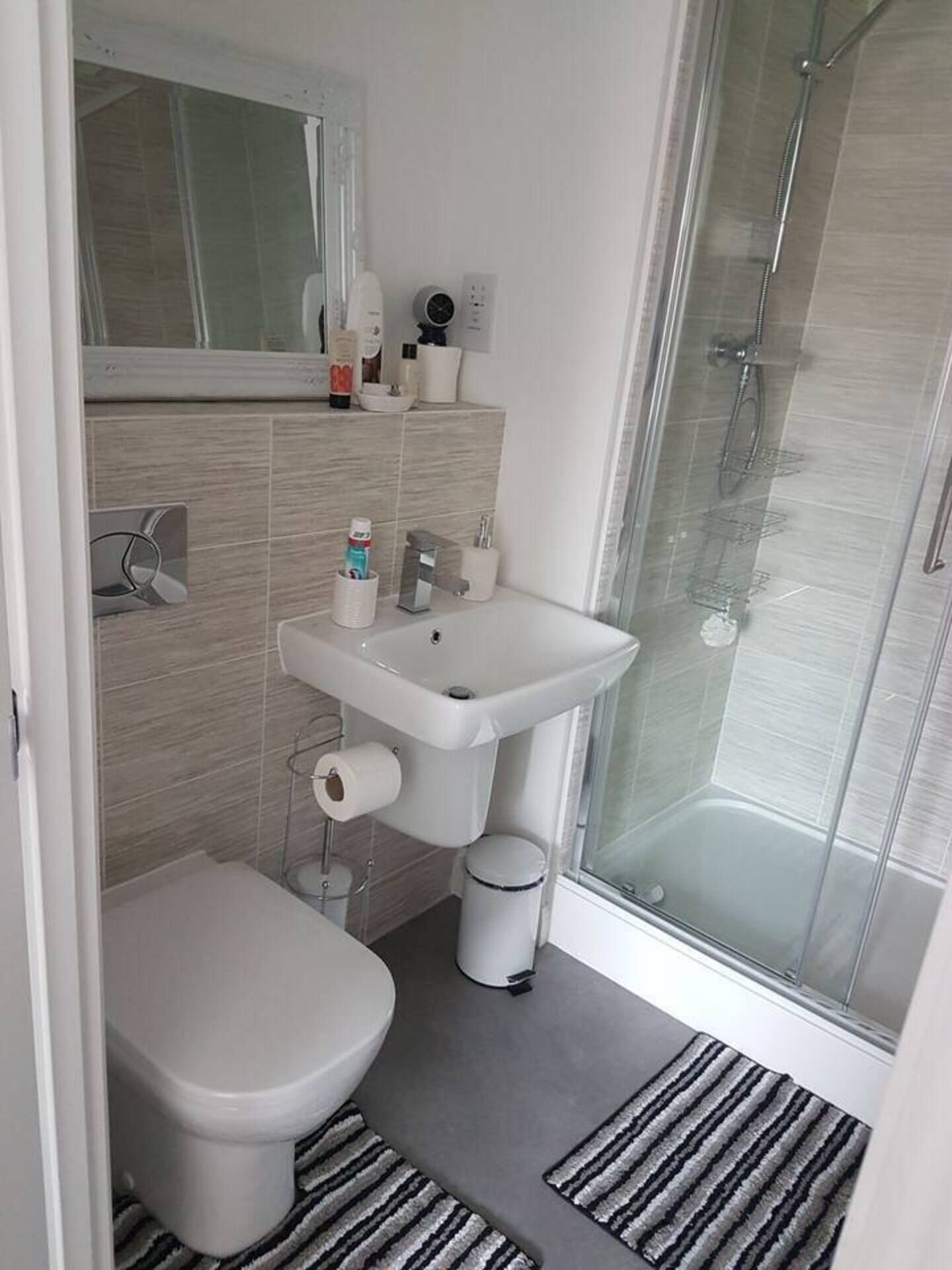 Apartment, 2 Queen Beds | Bathroom | Shower, hair dryer, towels
