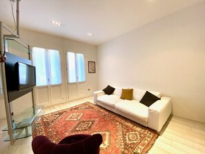 Apartamento design | Área de estar | TV de tela plana