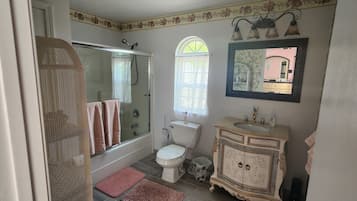 Combined shower/tub, hair dryer, towels, soap