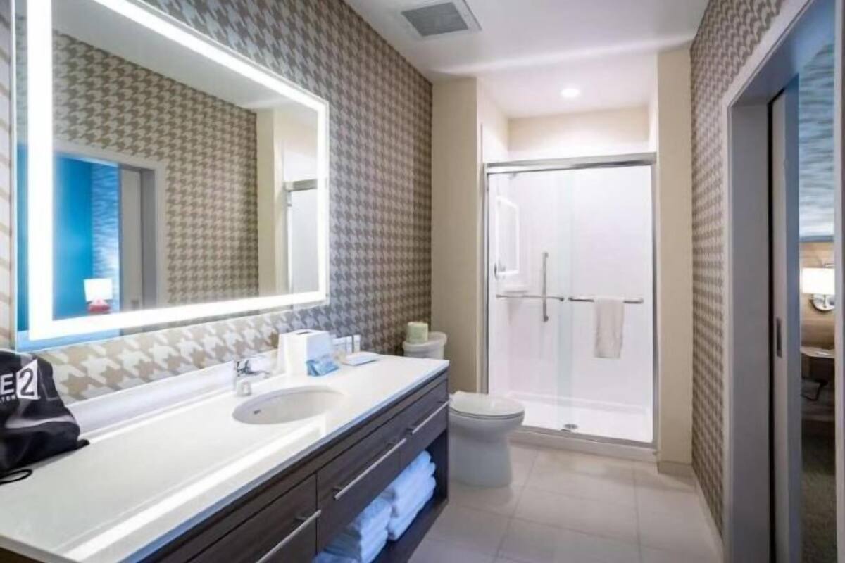 Hair dryer, towels, soap, shampoo