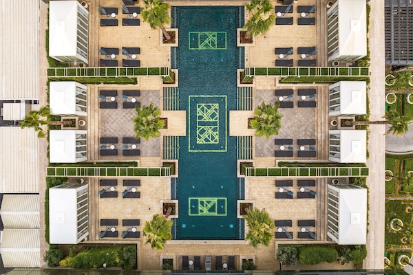 Outdoor pool, open 6:00 AM to 5:00 PM, cabanas (surcharge)
