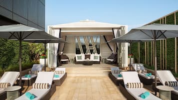 Outdoor pool, open 6:00 AM to 5:00 PM, pool cabanas (surcharge)