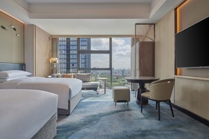 Hypo-allergenic bedding, down comforters, minibar, in-room safe