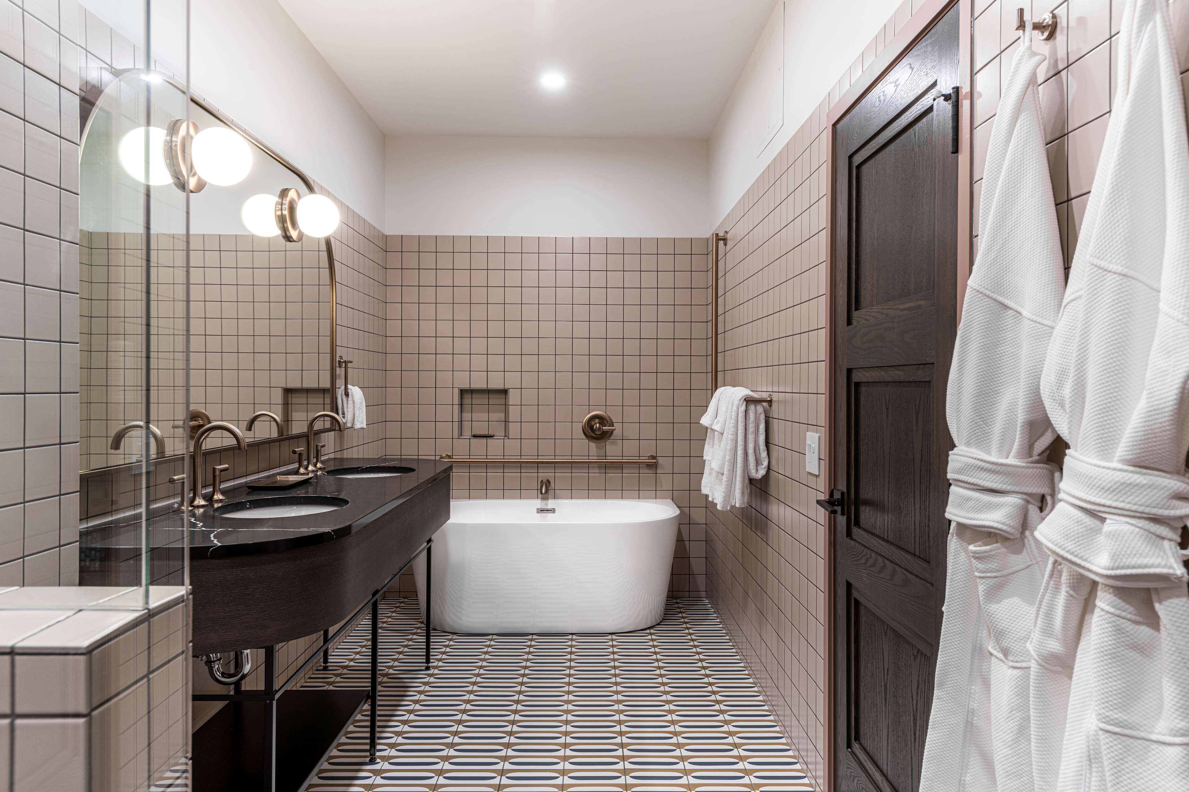 Suite, 1 King Bed with Sofa bed (Revel) | Bathroom | Hair dryer, bathrobes, towels, soap