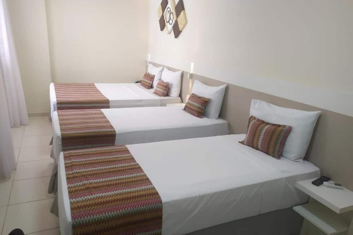 Family Room | Minibar, in-room safe, desk, free WiFi