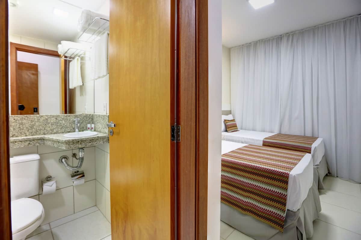 standard twin room, non smoking | bathroom | shower, free toiletries, towels