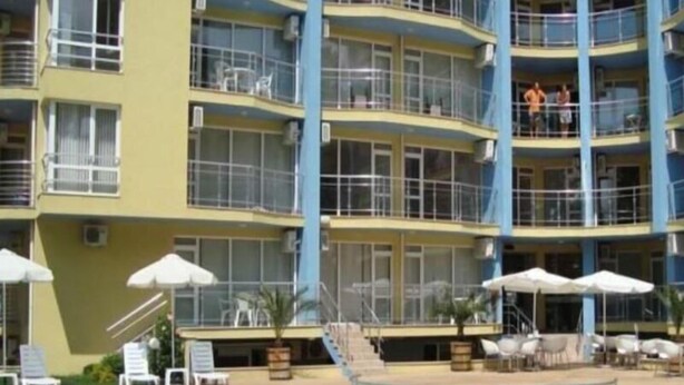 A multi-story hotel with a pool area, outdoor seating, and balconies. - Marack2 (Nessebar)