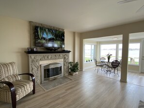 Smart TV, fireplace, books