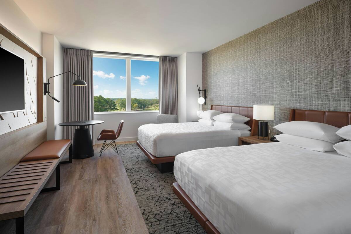 Premium bedding, down comforters, pillowtop beds, in-room safe