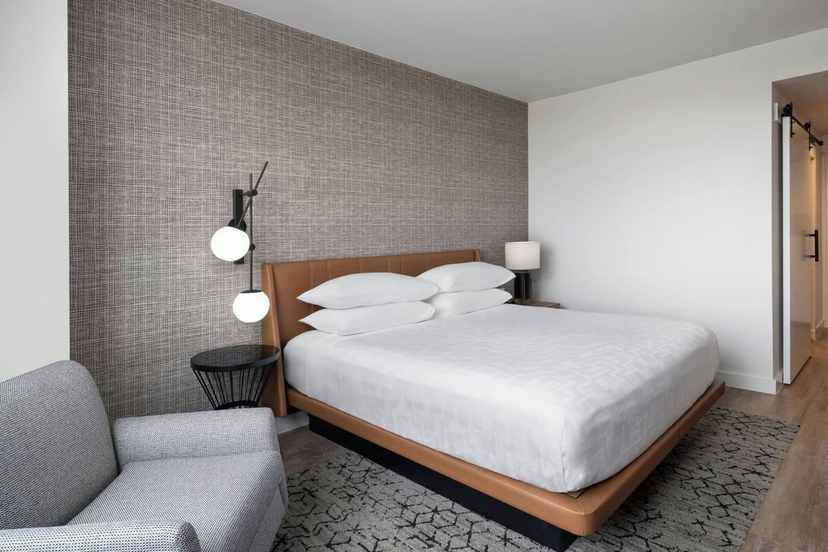 Premium bedding, down comforters, pillowtop beds, in-room safe